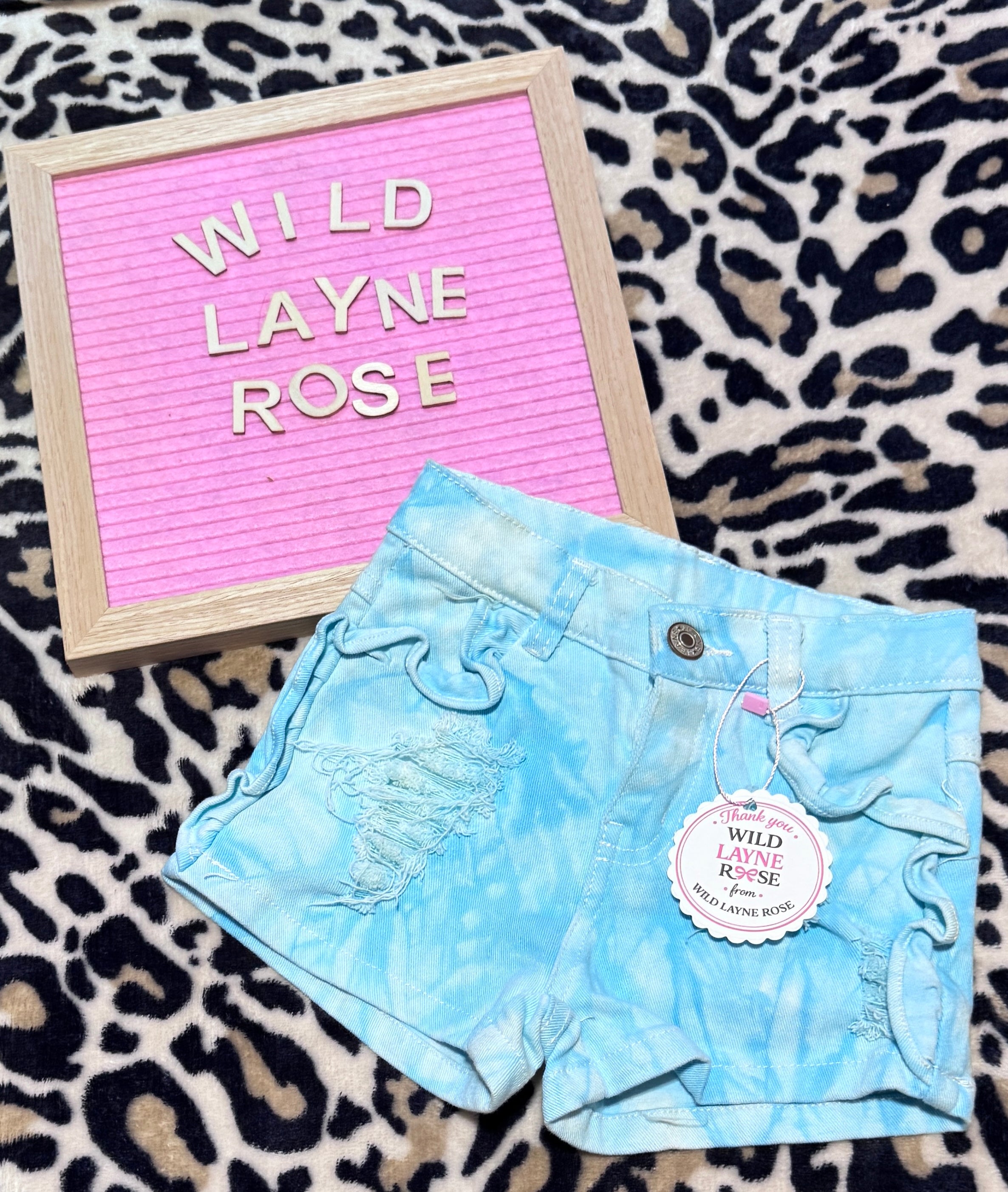 Aqua Ruffle Distressed Denim Shorts