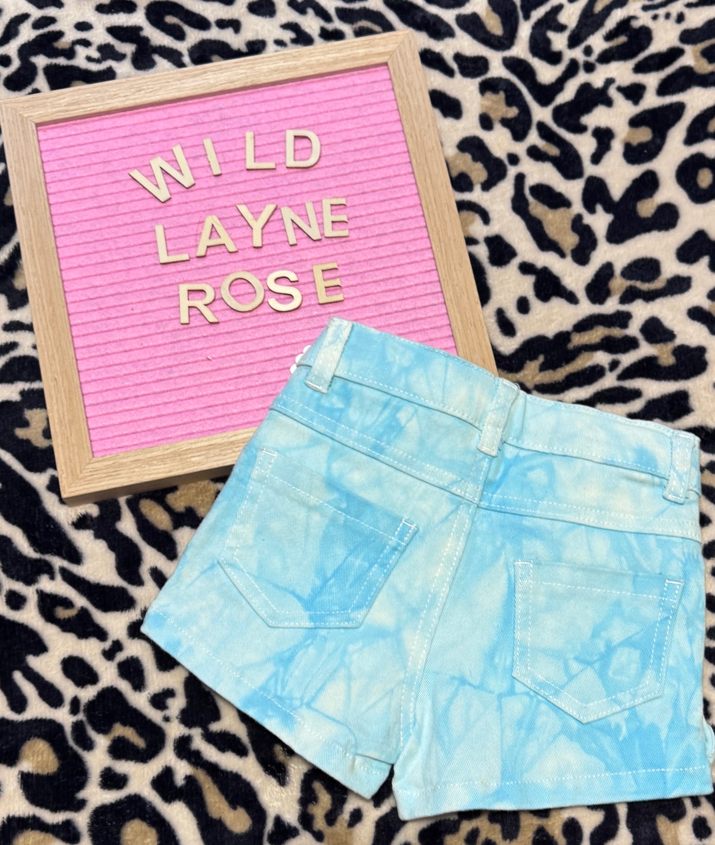 Aqua Ruffle Distressed Denim Shorts