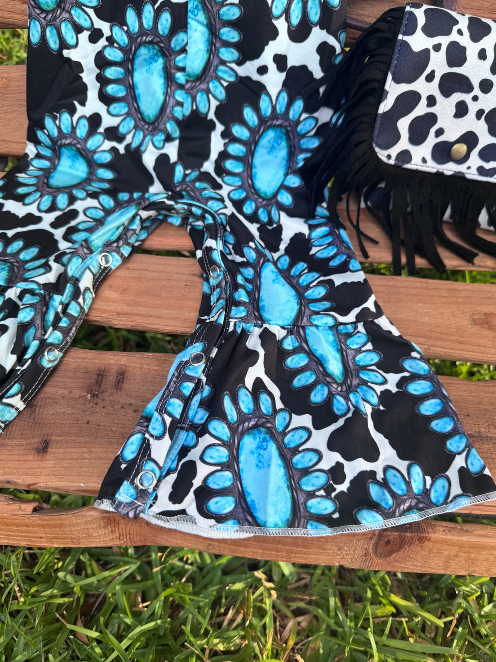Turquoise Cow Print Bell Romper