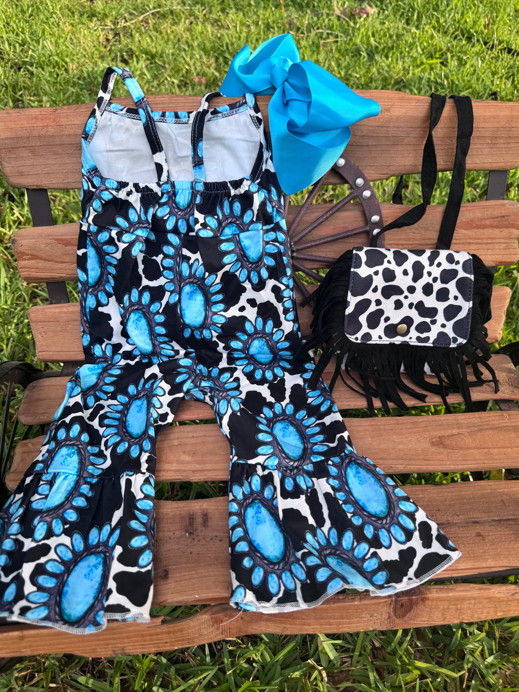 Turquoise Cow Print Bell Romper