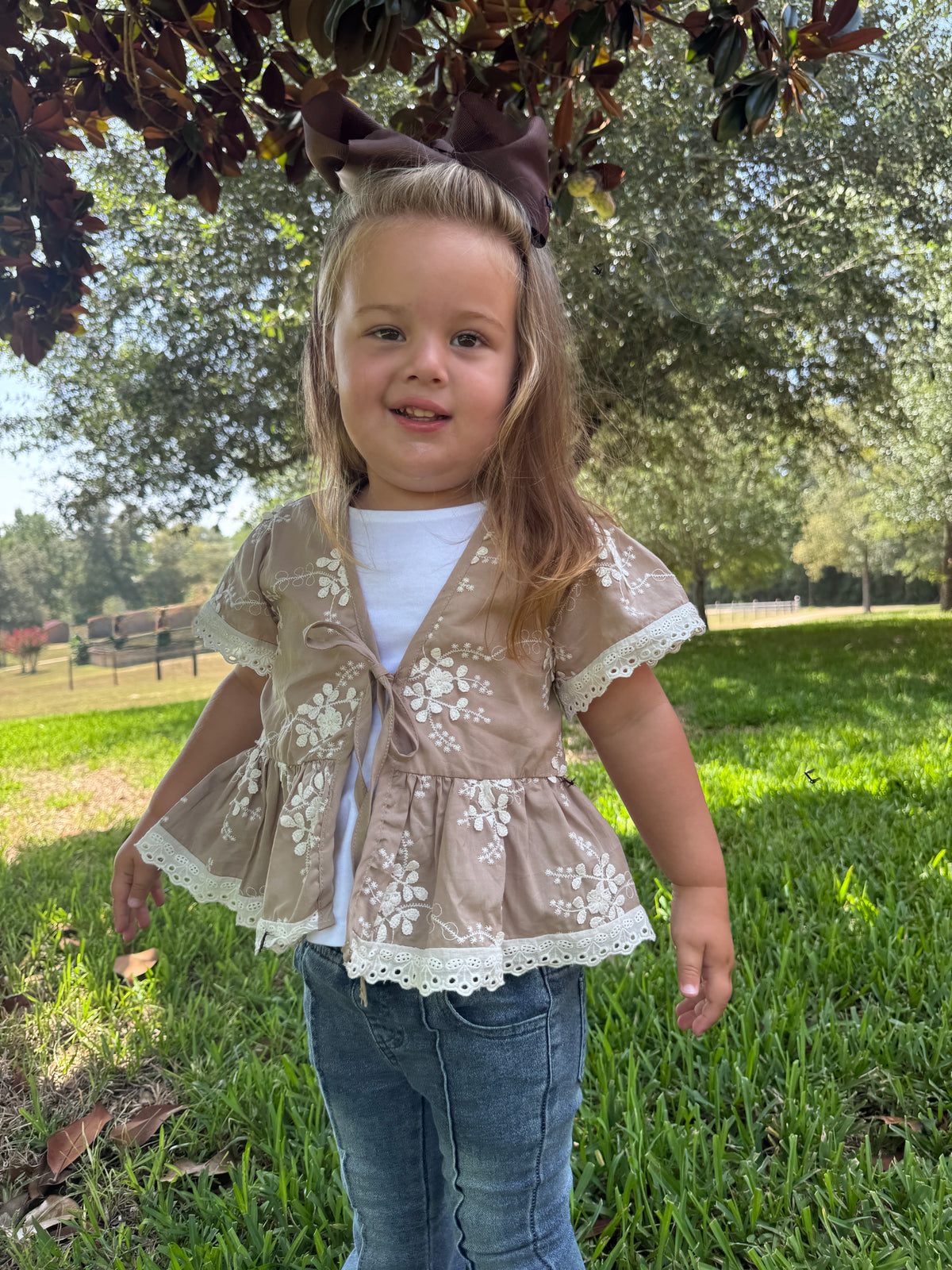 Savannah Embroidered Tie-Front Peplum Top